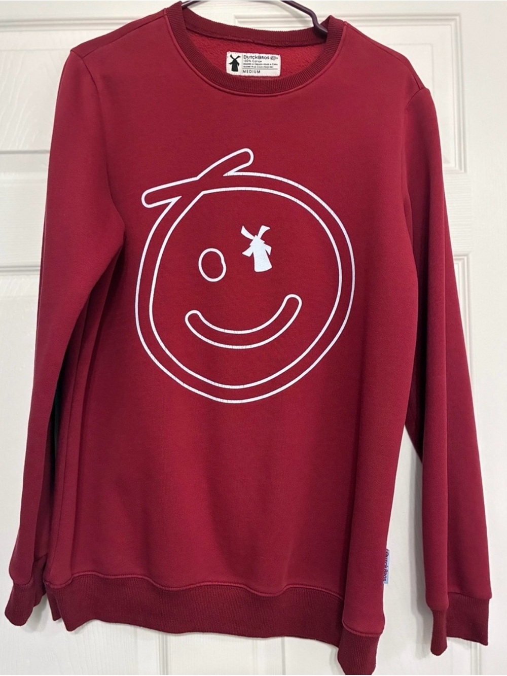 Dutch Bros Maroon Graphic Sweatshirt with White Smiley Windmill Logo